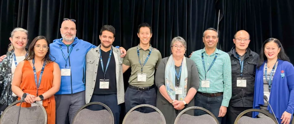 A group photo of nine health science professionals