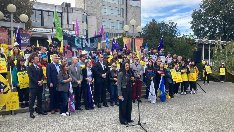 HSA President Sarah Kooner stands in front of a crowd in Victoria on September 2025.